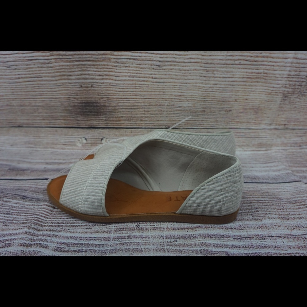 1. State Asymmetrical open toe flat